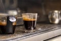 Expresso machine and coffee shots being processed for a drink at a Coffee house Royalty Free Stock Photo