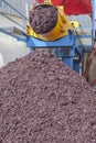 Expulsion of the pomace at winemaking factory