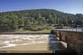 Expulsion of water after heavy rains in the reservoir of Puente Nuevo River Guadiato