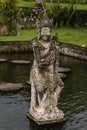 Exquisite ancient monument on indonesian culture, history and balinese religion - stony statue of human deityÃÂ± warrior or demon.