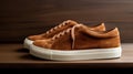 Exquisite Brown Platform Sneakers With Suede Texture On Wooden Table