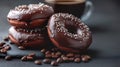 Exquisite chocolate donuts covered in white chocolate sprinkles and served with coffee beans. Coffee time Royalty Free Stock Photo
