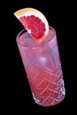 Exquisite cold lemonade with grapefruit on a dark background