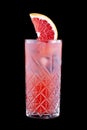 Exquisite cold lemonade with grapefruit on a dark background