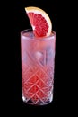 Exquisite cold lemonade with grapefruit on a dark background