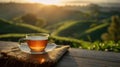 The exquisite cup of tea overlooking a serene landscape at sunrise. AI generated image Royalty Free Stock Photo