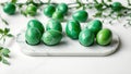 Exquisite Emerald Easter Eggs on Polished Periclase Marble A Luxurious Spring Decor Arrangement Royalty Free Stock Photo