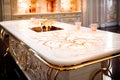 exquisite expensive kitchen made of marble, mother of pearl and gold with inlay