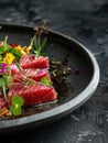 Exquisite food photography showcasing a seared tuna steak on a plate, highlighting World Tuna Day for a restaurant menu Royalty Free Stock Photo