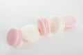 Exquisite french dessert, pink and cream macaron cakes