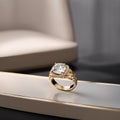 An exquisite gold ring with a diamond center stone is displayed providing a stunning visual