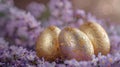 Golden Decorated Easter Eggs Amidst Purple Spring Flowers. Royalty Free Stock Photo