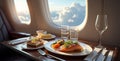 Gourmet Meal Served on Luxury First Class Flight with Cloud View Royalty Free Stock Photo