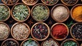 Exquisite gourmet spices and seasonings array in elegant wooden bowls on dark background