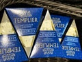 Exquisite handmade cheese Templier with characteristic packaging presented on a textured surface Royalty Free Stock Photo