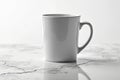 Elegant White Ceramic Mug on a Polished Marble Surface A Simple Modern Kitchen or Dining Accent Royalty Free Stock Photo