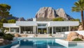 Exquisite modern white house with private pool, perfectly situated amidst breathtaking mountains