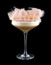 Exquisite original cocktails on a black background. With cotton candy