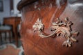 Exquisite Ornate Wooden Chest of Drawers in Luxurious and Opulent Living Room Setting