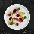 Exquisite Serving Creative Molecular Dish of Duck Breast, Baked Pear and Cherry Spheres Top View