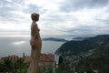 An exquisite statue of a woman in front of a bird& x27;s eye view in Nice, France