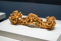 An exquisite traditional Chinese ornament, golden ruyi