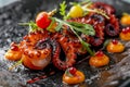 Exquisite traditional mediterranean grilled octopus on elegant black serving plate