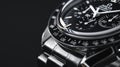 Exquisite wristwatch on black background, sleek modern design in black and silver tones, high-end luxurious feel