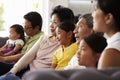 Extended Family Group At Home Watching TV Together Royalty Free Stock Photo