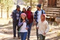 Extended Family Group On Walk Through Woods In Fall Royalty Free Stock Photo