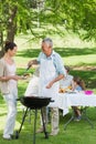 Extended family having lunch in the lawn Royalty Free Stock Photo