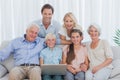 Extended family sitting on couch Royalty Free Stock Photo