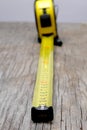 Extended yellow measure tape Royalty Free Stock Photo