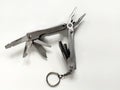 Compact, stainless steel multi-tool with pliers open at the top. Royalty Free Stock Photo