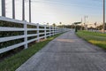 An extensive curved white fence