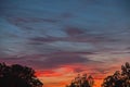 Red clouds over the plain.