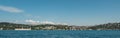 Extensive panorama of the beautiful cozy houses of Istanbul on the coast. View from the sea