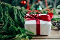 Extensive series of holiday shots with a variety of props and backgrounds. Lots of copyspace for ads. Christmas presents on wooden Royalty Free Stock Photo