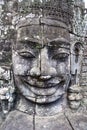 Exterior of the Bayon temple with gargantuan faces, Angkor Thom, Angkor, Cambodia Royalty Free Stock Photo