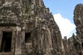 Exterior of the Bayon temple with gargantuan faces, Angkor Thom, Angkor, Cambodia