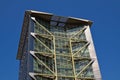 Exterior of beautiful modern building against blue sky, low angle view Royalty Free Stock Photo