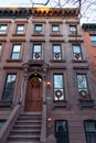Beautiful Old Brownstone Home with Christmas Wreath Decorations in Prospect Heights of Brooklyn New York Royalty Free Stock Photo