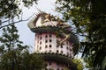 Exterior building with king of serpent naga and chinese dragon wrapped around tower for thai people travel visit and respect