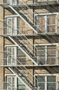 Exterior of a building with old fire escape in New York City Royalty Free Stock Photo