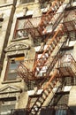 Exterior of a building with old fire escape in New York City Royalty Free Stock Photo