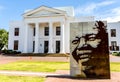 Exterior of a classical beautiful building and a portrait of Nelson Mandela in Stellenbosch Cape University town in South Africa