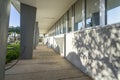 exterior corridor with plastic benches in the headquarters building of RTP, Portuguese radio and television in Lisbon.