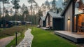 Exterior of a country cottage. Small houses on background of forest. Ai Generative Royalty Free Stock Photo