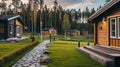 Exterior of a country cottage. Small houses on background of forest. Ai Generative Royalty Free Stock Photo