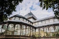 Exterior of the Crystal Palace in Madrid, a must for tourists, in the Retiro Park Royalty Free Stock Photo